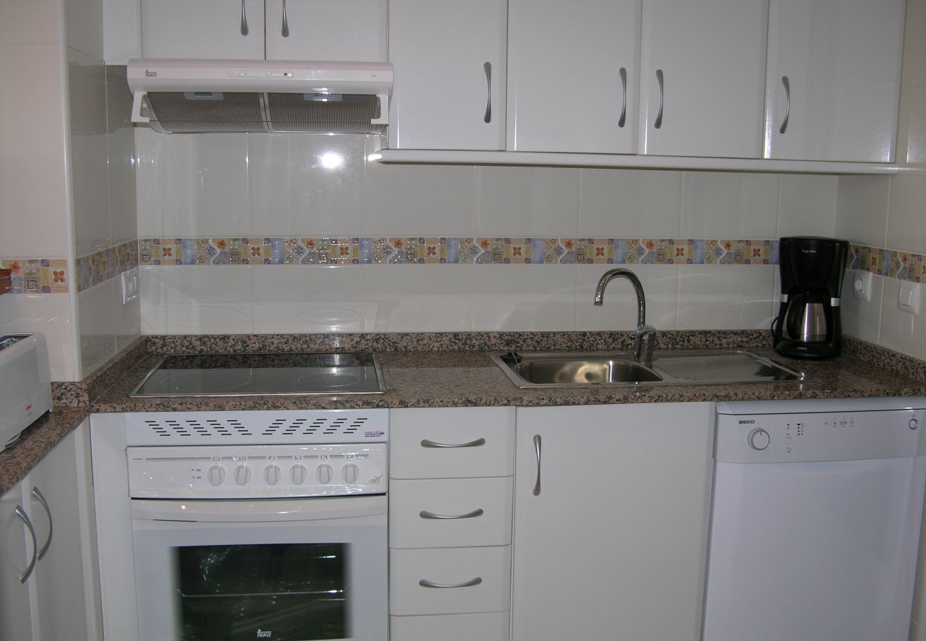 Cocina con electrodomésticos modernos - Resort Choice